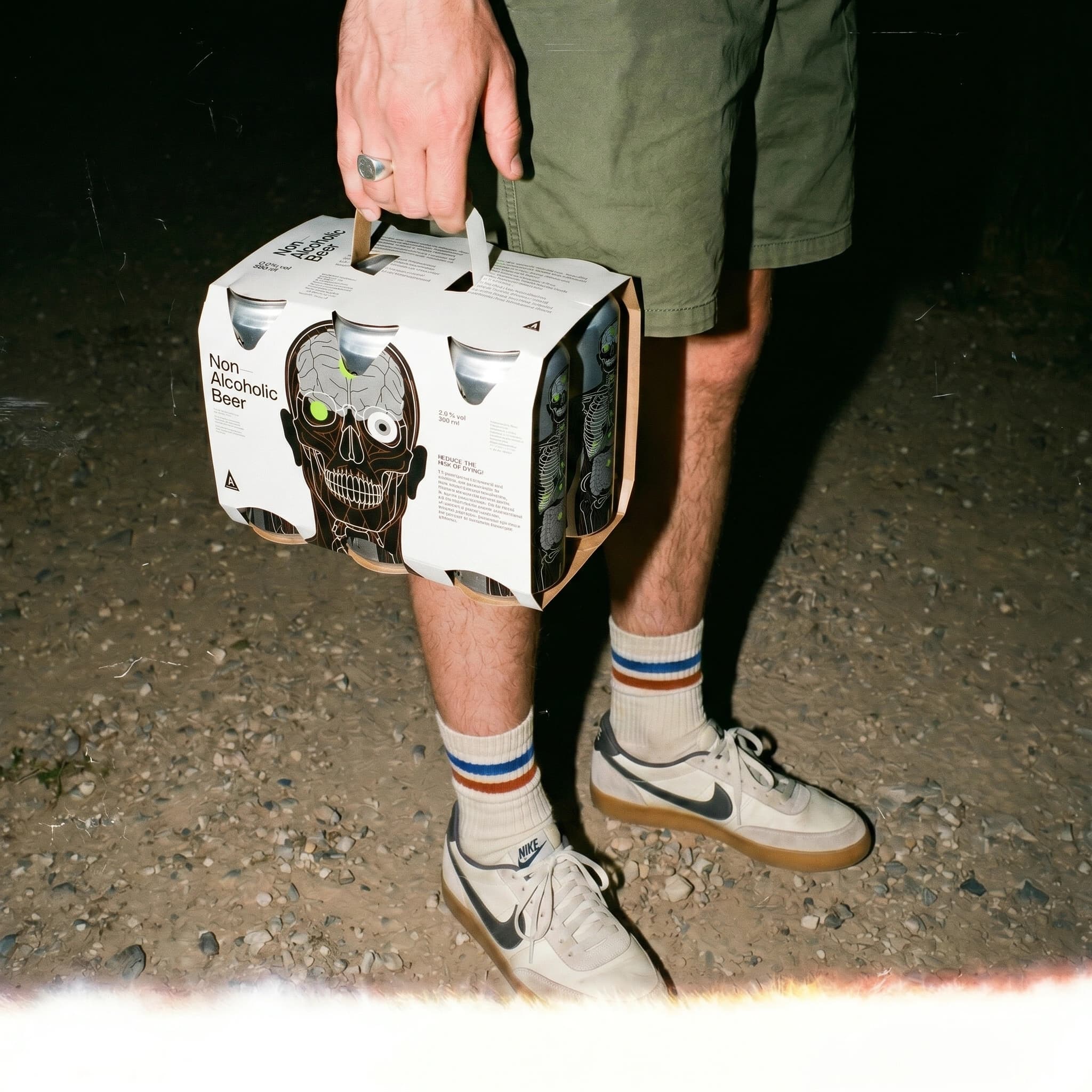 Person carrying Non-Alcoholic Beer 6-pack